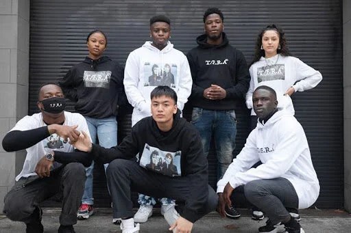 Sam and Prestige presenting the season 4 collection featuring aspiring Western Sydney artists; Geraldine, Josh, Danielle, John Charles, and Emmanuel. (Image: @degenerate.art)